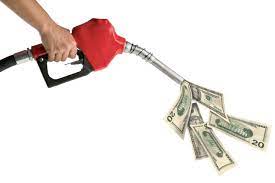 money coming out of a gas nozzle