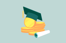 graduation cap on a pile of money