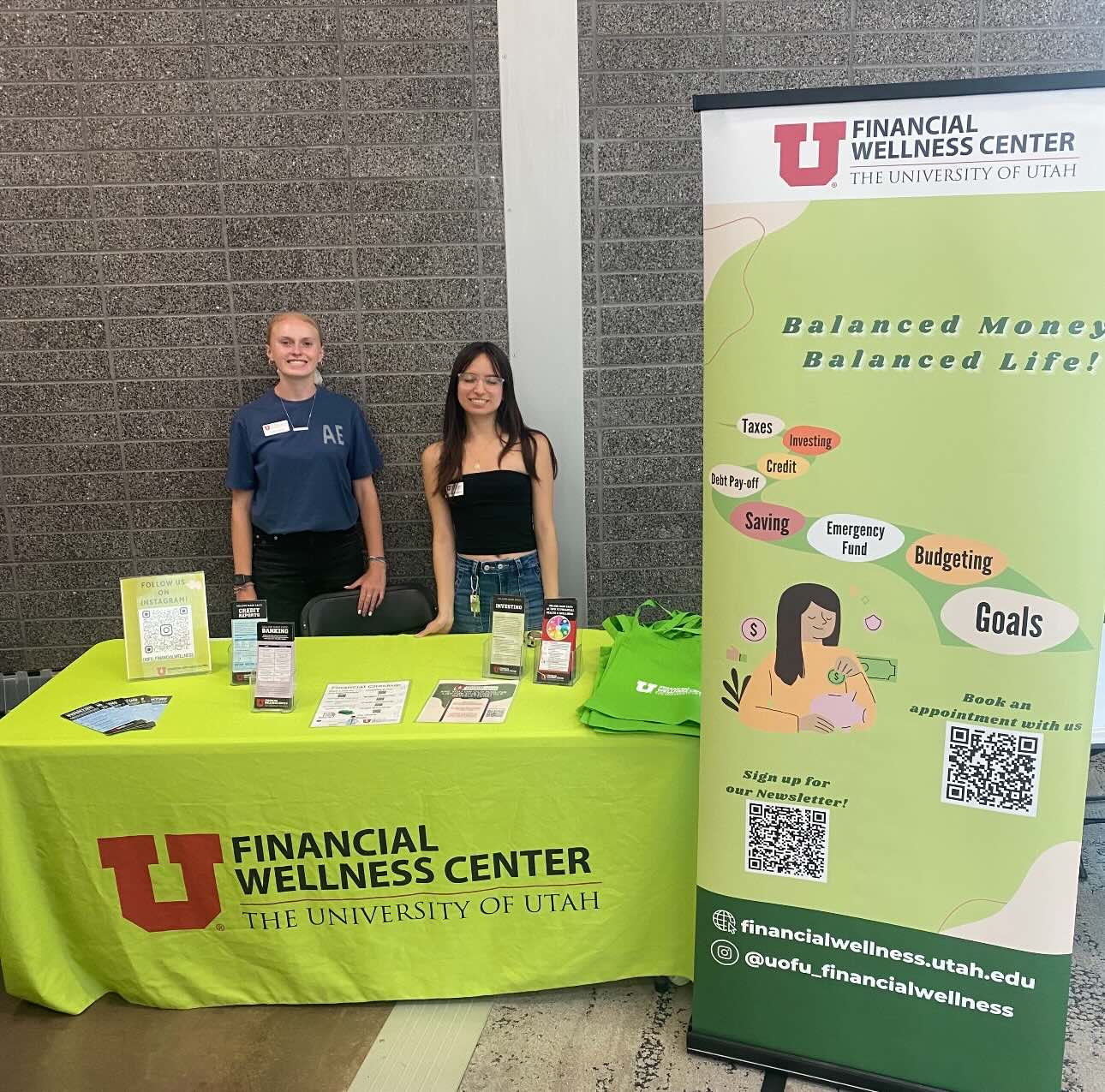 two college students tabling event