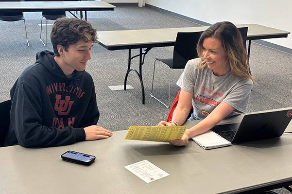 VITA Volunteer helping student with taxes